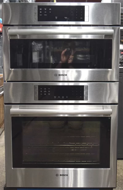 A close-up of a brand new Bosch 800 Series HBL87M53UC 30-inch Smart Microwave Combination Wall Oven.