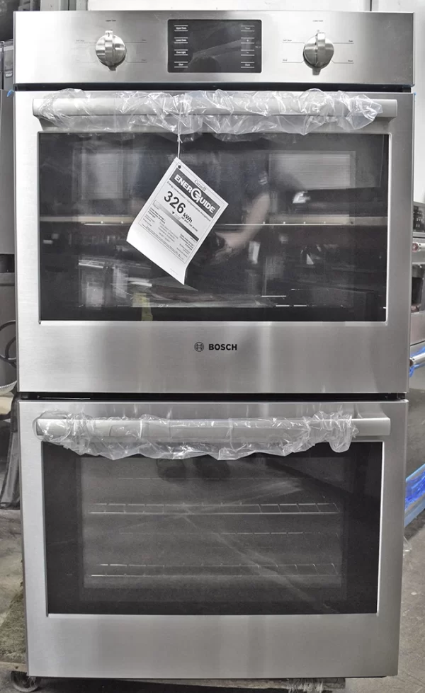 A close-up of a brand new Bosch 500 Series HBL5551UC 30-inch Double Electric Wall Oven.