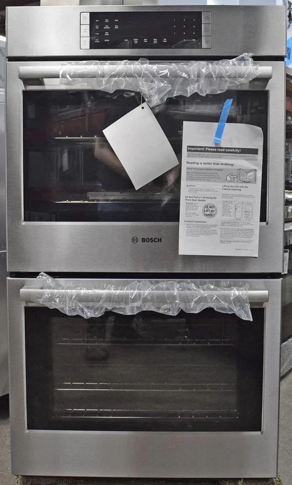 A close-up of a brand new Bosch 800 Series HBL8651UC 30-inch Double Electric Wall oven.