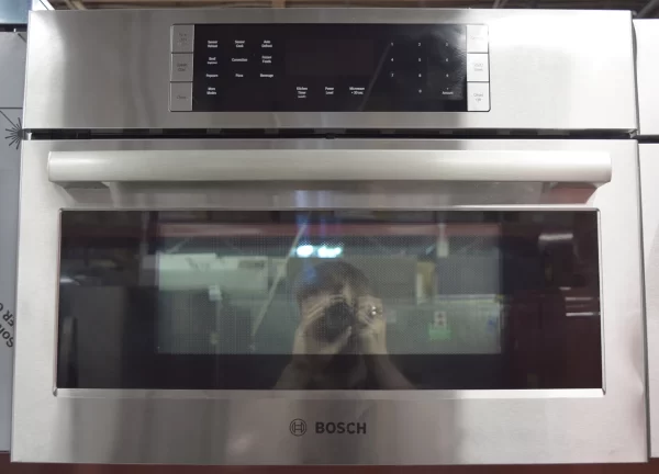 A close-up of a brand new Bosch 800 Series HMC87151UC 27-inch Speed Oven with 1.6 cu. ft. Capacity.