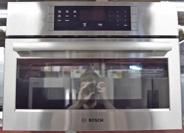 A close-up of a brand new Bosch 500 Series HMB57152UC 27-Inch Built-In Microwave Oven