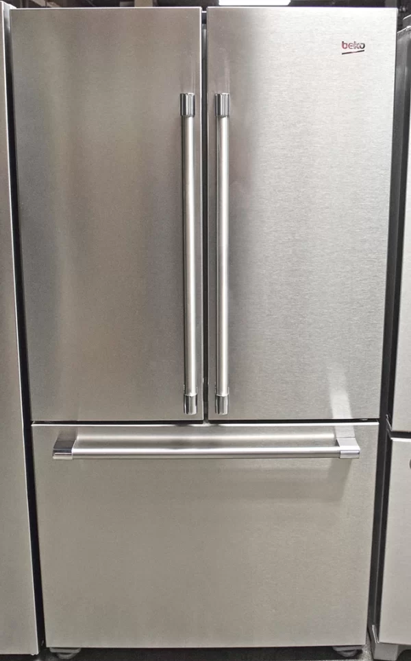 A close-up of the front view of a Beko BFFD3624SS 36-inch counter-depth freestanding 3-Door French Door Refrigerator.