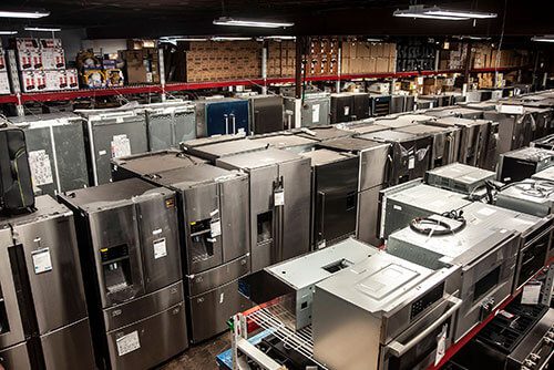 A wide shot of Appliances displayed in an appliance store.